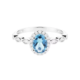 Pierścionek z białego złota z niebieskim topazem i diamentami TP0144BNTZ