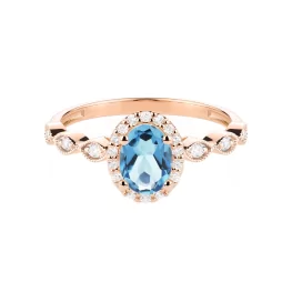 Pierścionek z różowego złota z niebieskim topazem i diamentami TP0144RNTZ