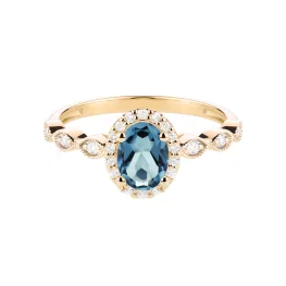 Złoty pierścionek z topazem London Blue i diamentami TP0144ZLTZ