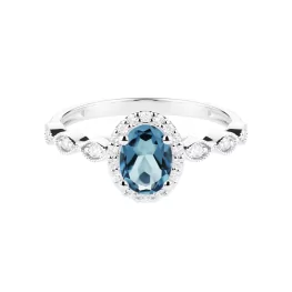 Pierścionek z białego złota z topazem London Blue i diamentami TP0144BLTZ