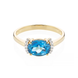 Złoty pierścionek z topazem london blue i diamentami